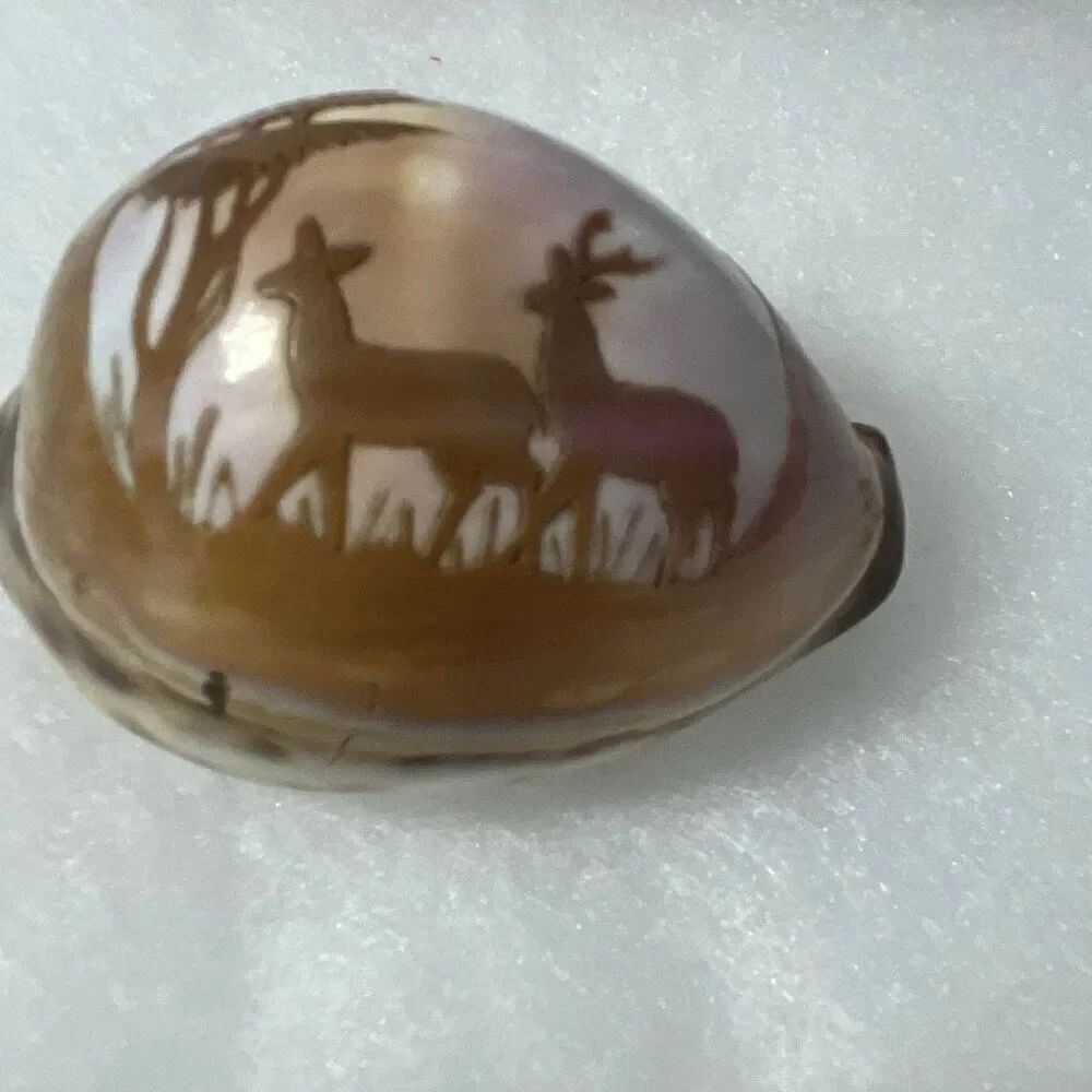 Hand carved Cowrie shell doe buck trees